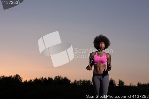 Image of young african american woman in nature