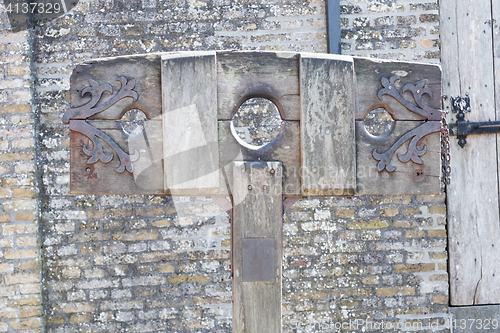 Image of Old wooden pillory close up