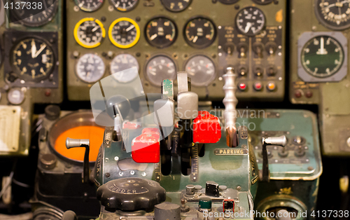 Image of Center console and throttles in airplane