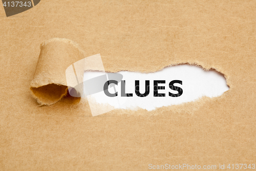 Image of Clues Ripped Paper Concept