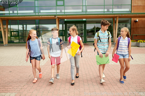 Image of group of happy elementary school students walking