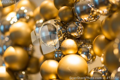 Image of golden christmas decoration or garland of beads