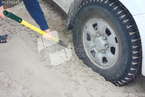 Image of car in sand