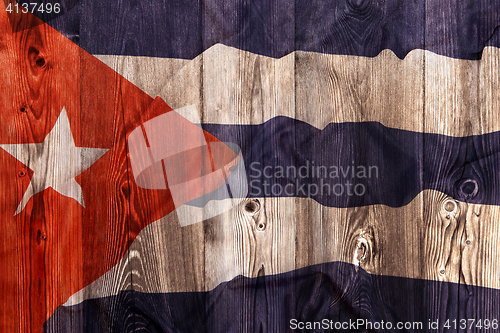 Image of National flag of Cuba, wooden background