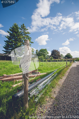 Image of Garden lawn with a fence