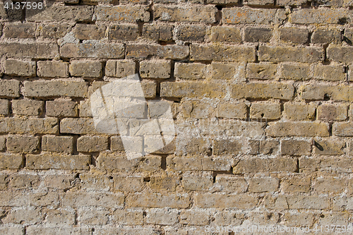 Image of Brick wall with old stones