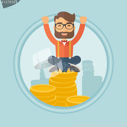 Image of Happy businessman sitting on coins.