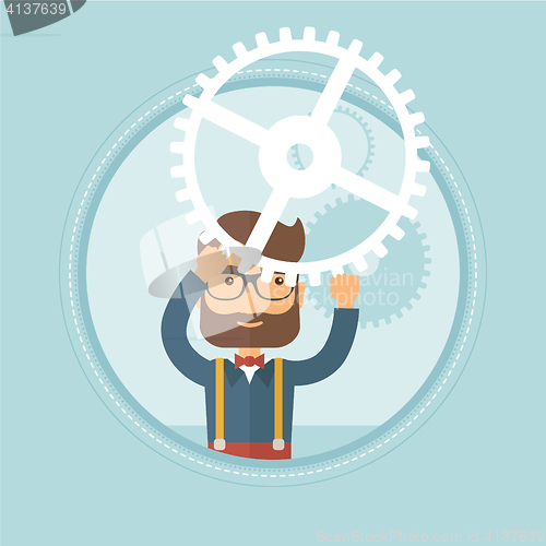 Image of Businessman holding cogwheel above his head.