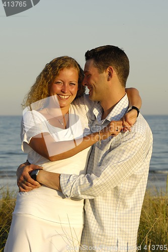 Image of Happy young couple at beach