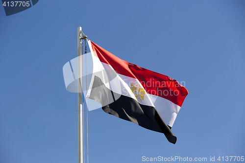 Image of National flag of Egypt on a flagpole