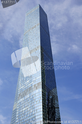 Image of Modern buildings of glass and steel skyscrapers against the sky