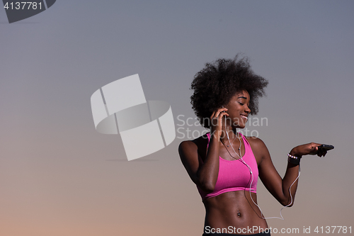 Image of young african american woman in nature