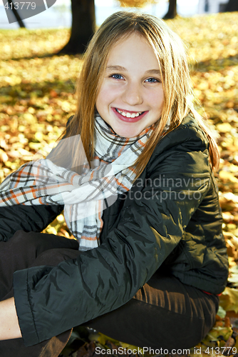 Image of Teenage girl in the fall