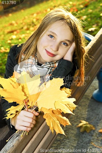 Image of Teenage girl in the fall