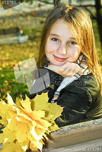 Image of Teenage girl in the fall
