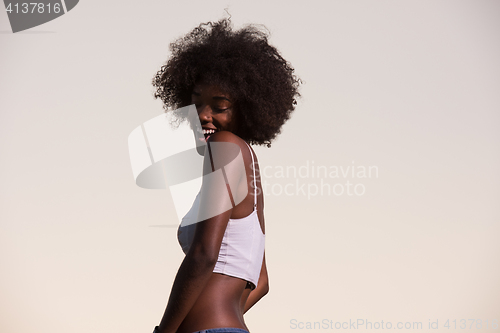 Image of young black woman in nature