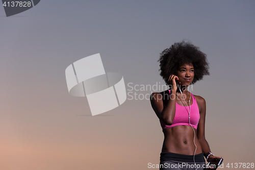 Image of young african american woman in nature