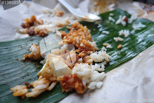 Image of Leftover rice on banana leave