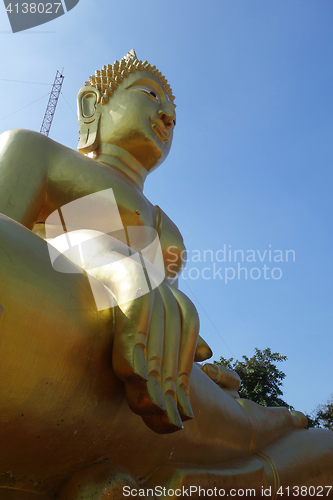 Image of Golden Buddha statue of Big Buddha over blue sky