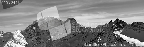 Image of Black and white panorama on winter snow mountains