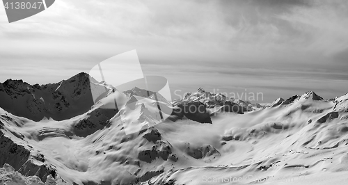 Image of Black and white panorama of Caucasus Mountains in snow winter ev