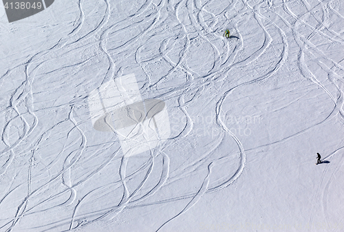 Image of Snowboarders and skiers on off piste slope