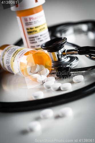 Image of Non-Proprietary Medicine Prescription Bottles and Spilled Pills 