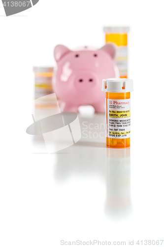 Image of Piggy Bank and Non-Proprietary Medicine Prescription Bottles Iso