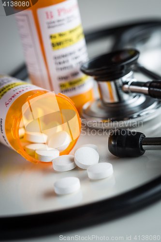 Image of Non-Proprietary Medicine Prescription Bottles and Spilled Pills 