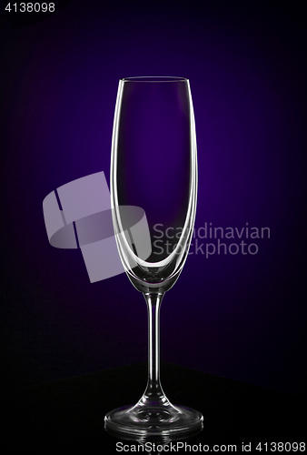 Image of Empty wine glass on dark red