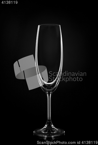 Image of Empty wine glass on dark red