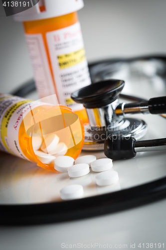 Image of Non-Proprietary Medicine Prescription Bottles and Spilled Pills 