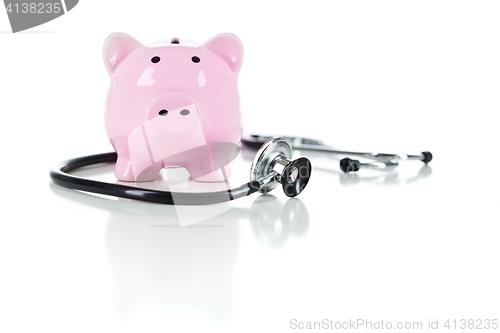 Image of Piggy Bank and Stethoscope Isolated on White