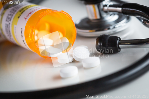 Image of Non-Proprietary Medicine Prescription Bottles and Spilled Pills 