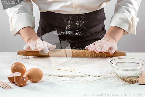 Image of Hands kneading a dough