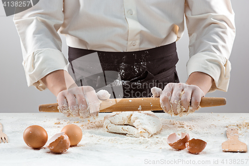 Image of Hands kneading a dough