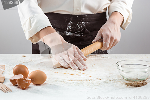 Image of Hands kneading a dough