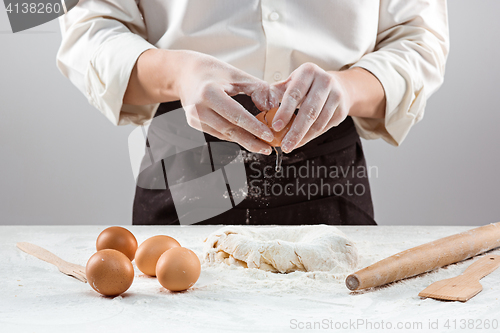 Image of Hands kneading a dough