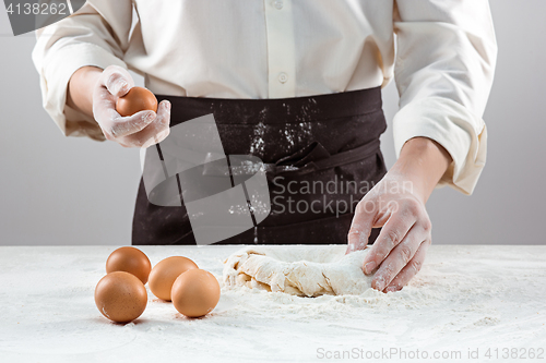 Image of Hands kneading a dough