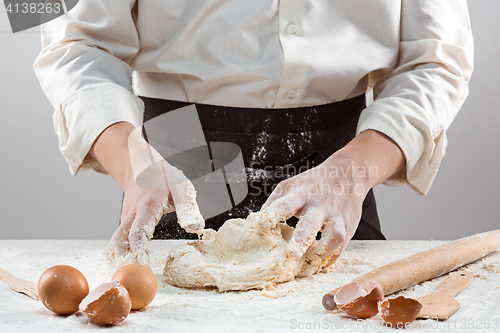 Image of Hands kneading a dough