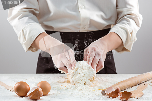 Image of Hands kneading a dough