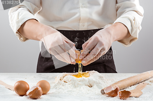 Image of Hands kneading a dough