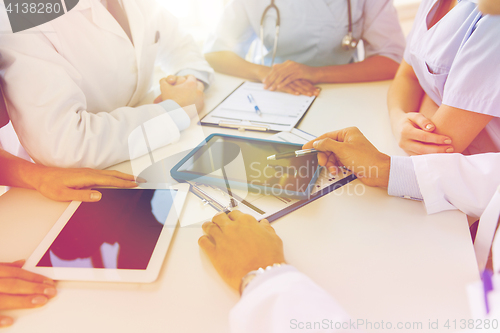 Image of group of doctors meeting at hospital office