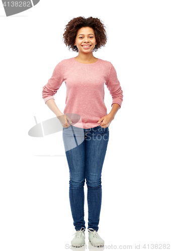 Image of happy african american young woman over white