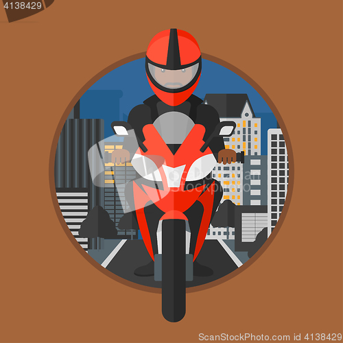 Image of Man riding motorcycle.