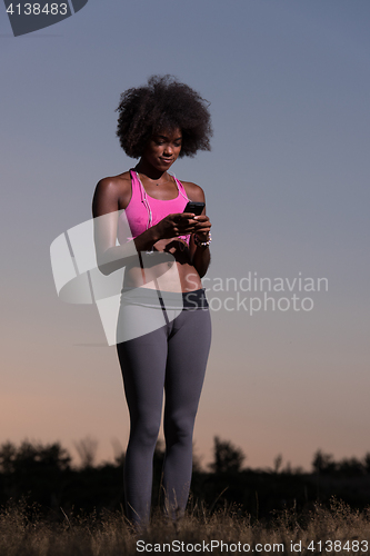 Image of young african american woman in nature