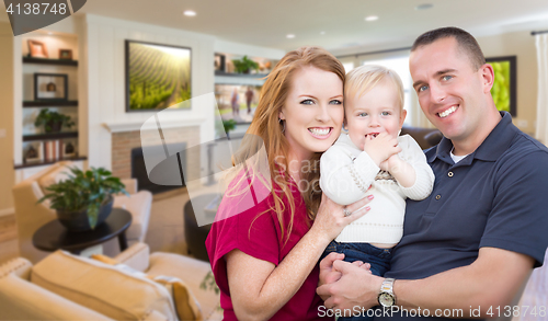 Image of Young Military Family Inside Their Beautiful Living Room