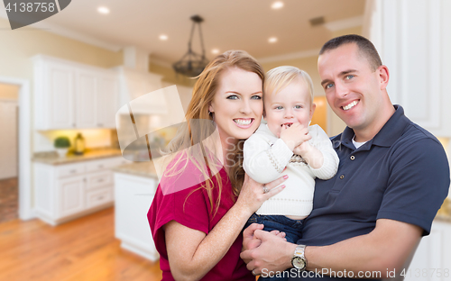 Image of Young Military Family Inside Their Beautiful Kitchen