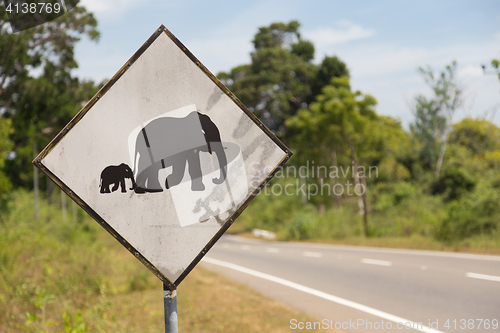 Image of Road sign in Sri Lanka. Caution, elephants crossing the road.