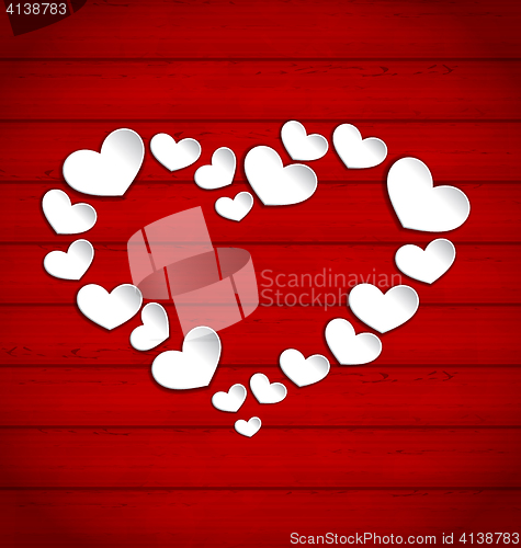Image of Wooden background with frame made in paper hearts for Valentines